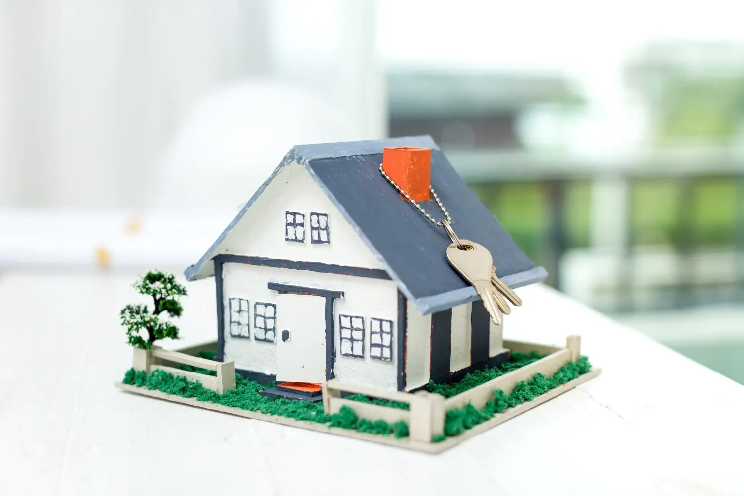 Homeowner reviewing paperwork at a kitchen table